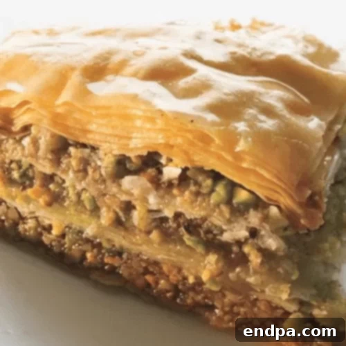 97 Effortless Autumn Delights 32 Golden, flaky Walnut and Pistachio Baklava, drizzled with syrup.