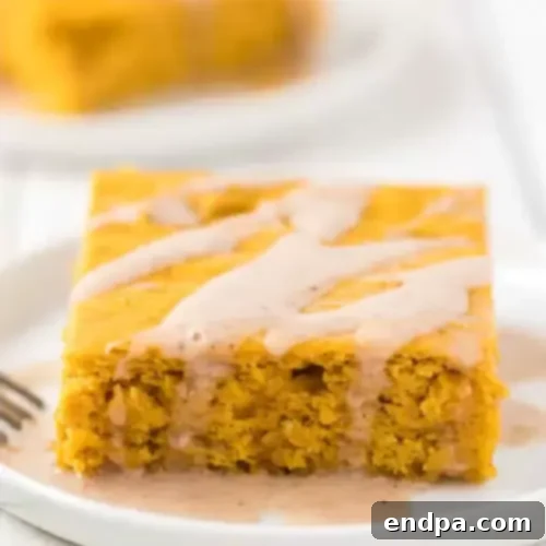 97 Effortless Autumn Delights 6 A moist and simple Pumpkin Cake, topped with a dusting of powdered sugar.