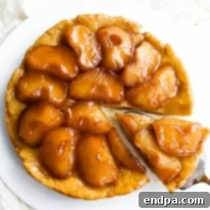 97 Effortless Autumn Delights 40 A golden Apple Tarte Tatin, showing caramelized apples and a flaky crust.