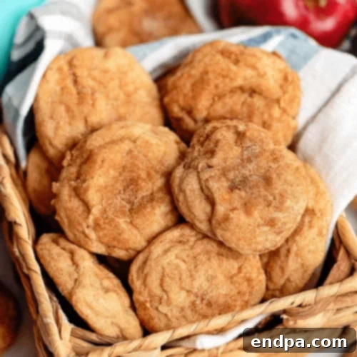 97 Effortless Autumn Delights 42 Soft Cinnamon Sugar Apple Cookies with visible apple chunks.