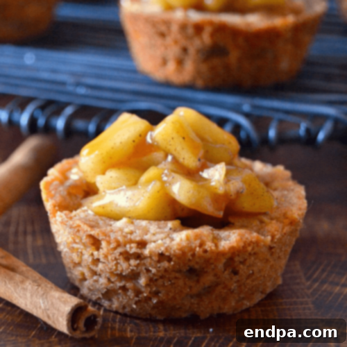 97 Effortless Autumn Delights 57 Mini Apple Crisp Cookie Cups with apple filling and an oatmeal crust.