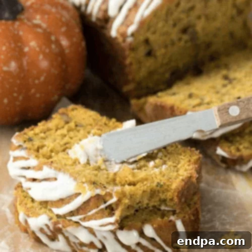 97 Effortless Autumn Delights 60 A loaf of Pumpkin Zucchini Bread, showing its moist crumb.