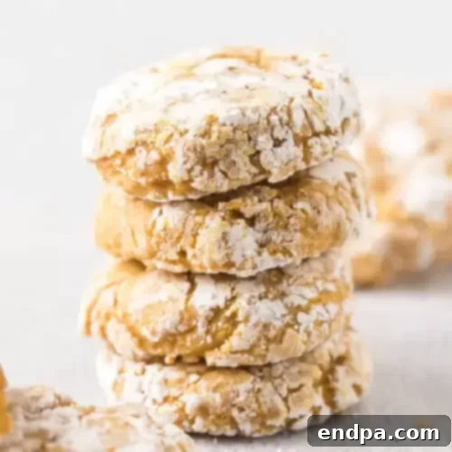 97 Effortless Autumn Delights 9 Soft and fluffy Gluten-Free Pumpkin Cookies on a plate.