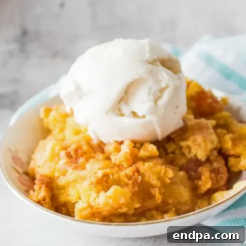 97 Effortless Autumn Delights 67 A bubbling Apple Dump Cake, with golden cake mix and apple filling.