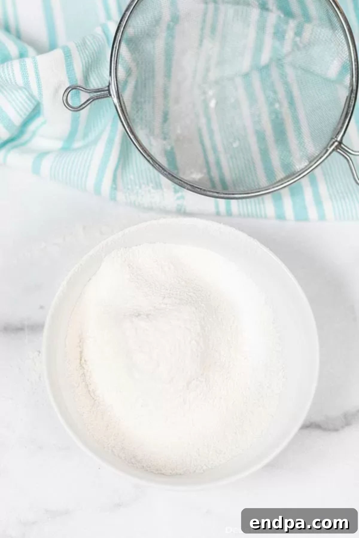 Bake Better with Homemade Cake Flour 5 The finished homemade cake flour, light and fine, in a clean bowl.