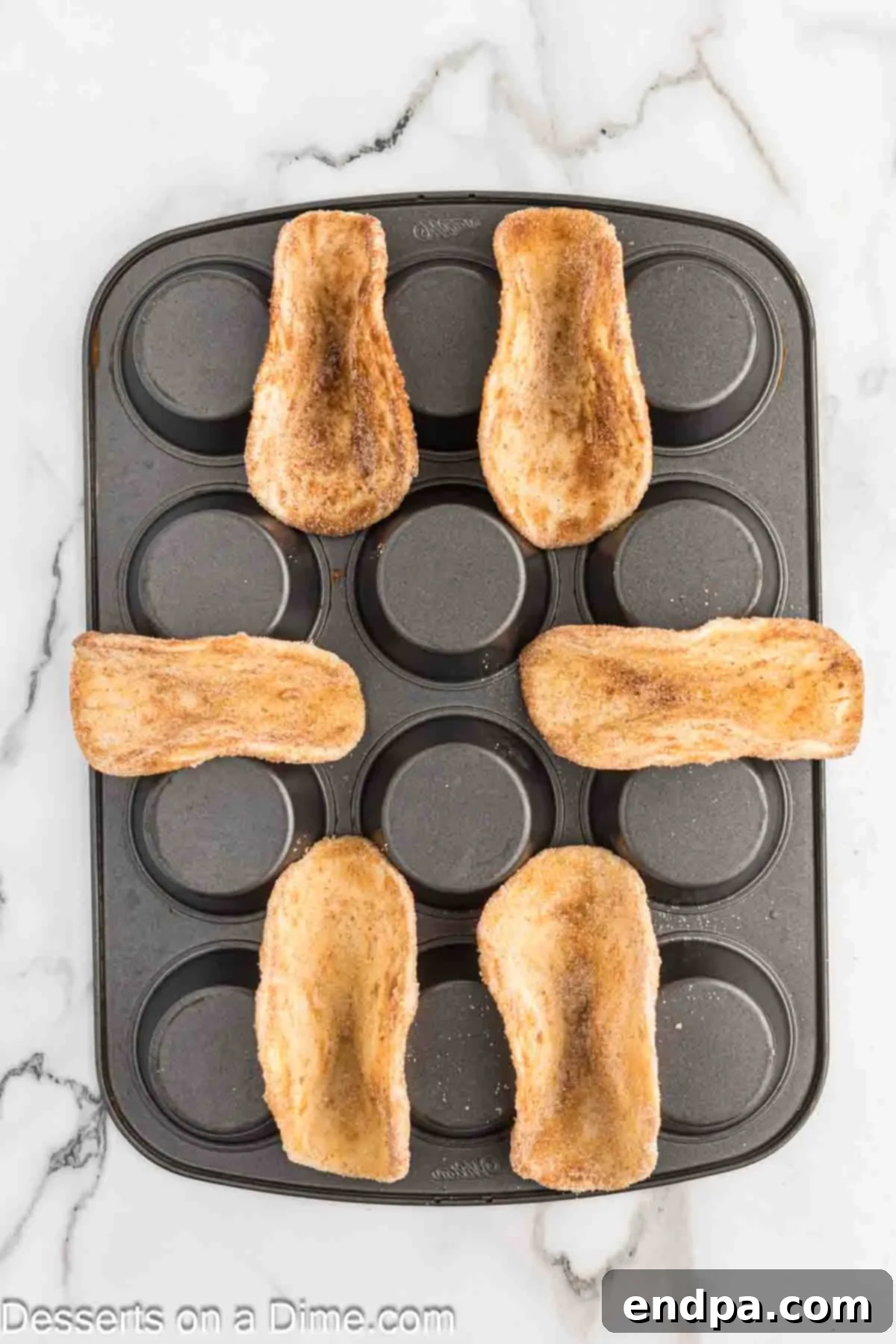 Apple Crisp Tacos 6 Tortillas in between muffin tins.