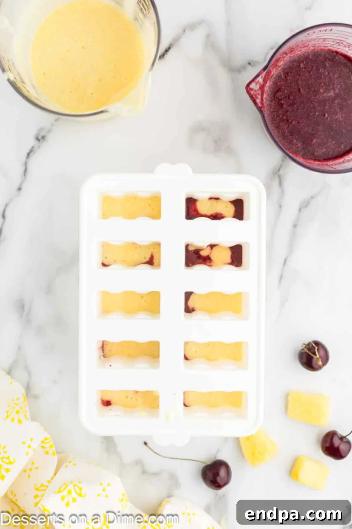 Mixture poured into popsicle molds.