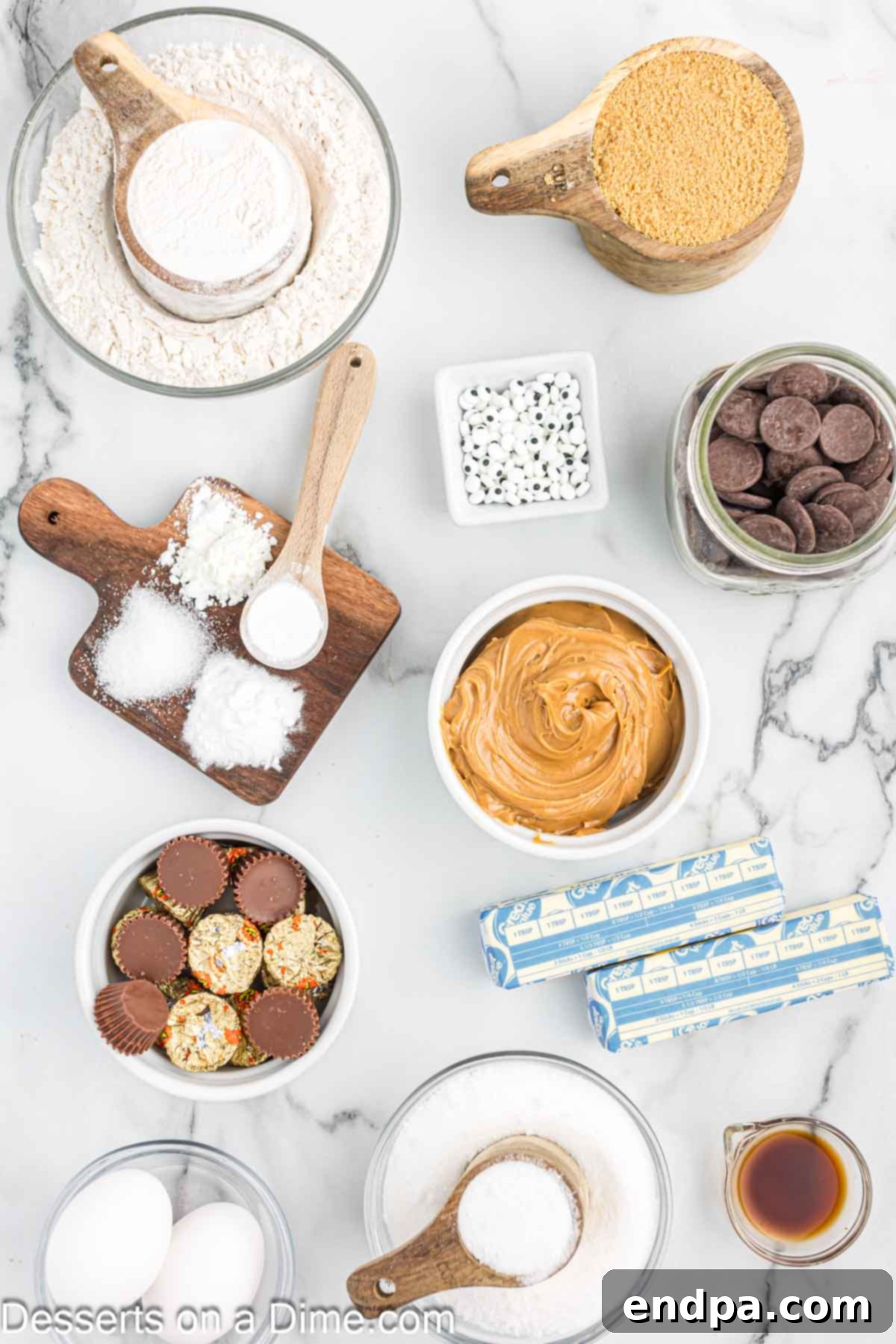Ingredients for Halloween Spider Cookies - flour, brown sugar, butter, peanut butter, eggs, peanut butter cups, candy eyes, chocolate melting wafers.