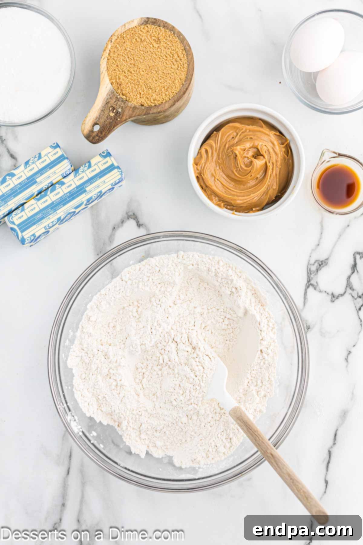 Dry ingredients combined together in a bowl for Halloween spider cookies.