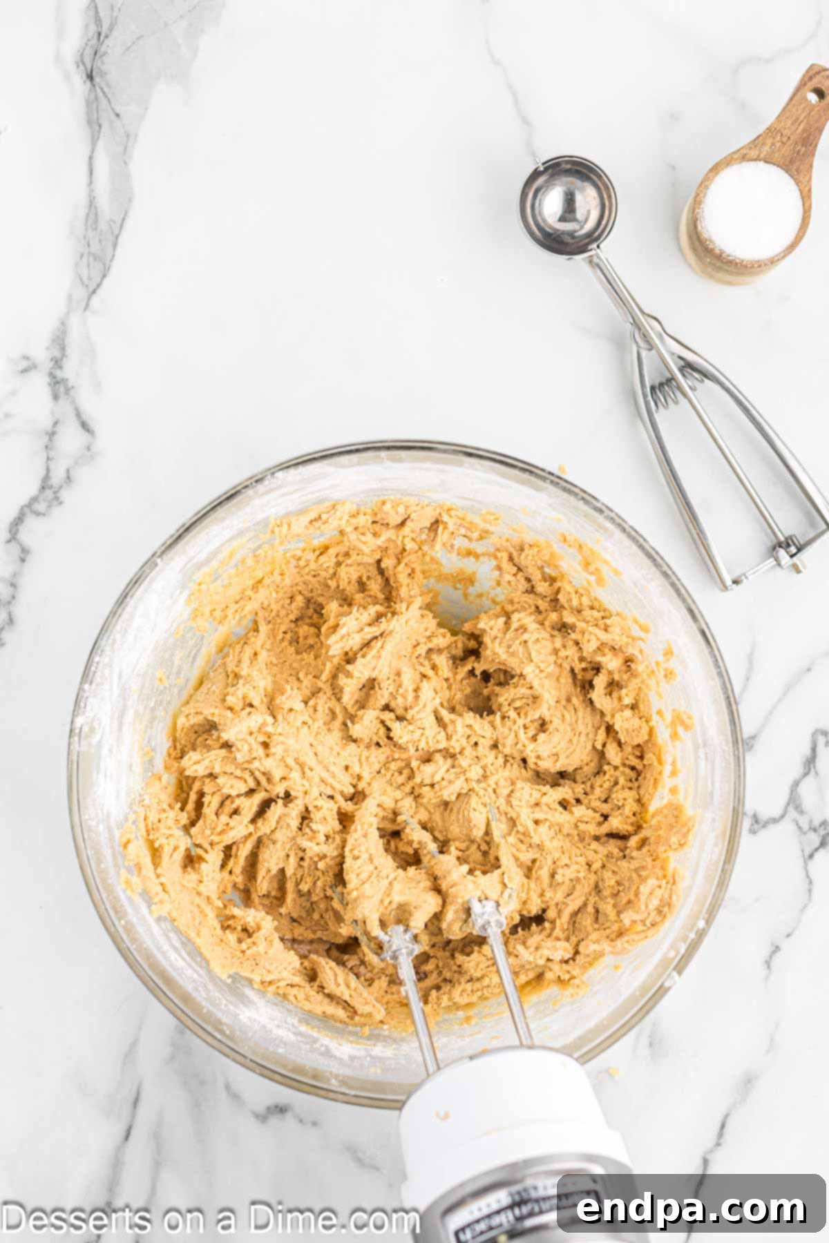 Cookie dough batter ready to be formed into balls for baking.