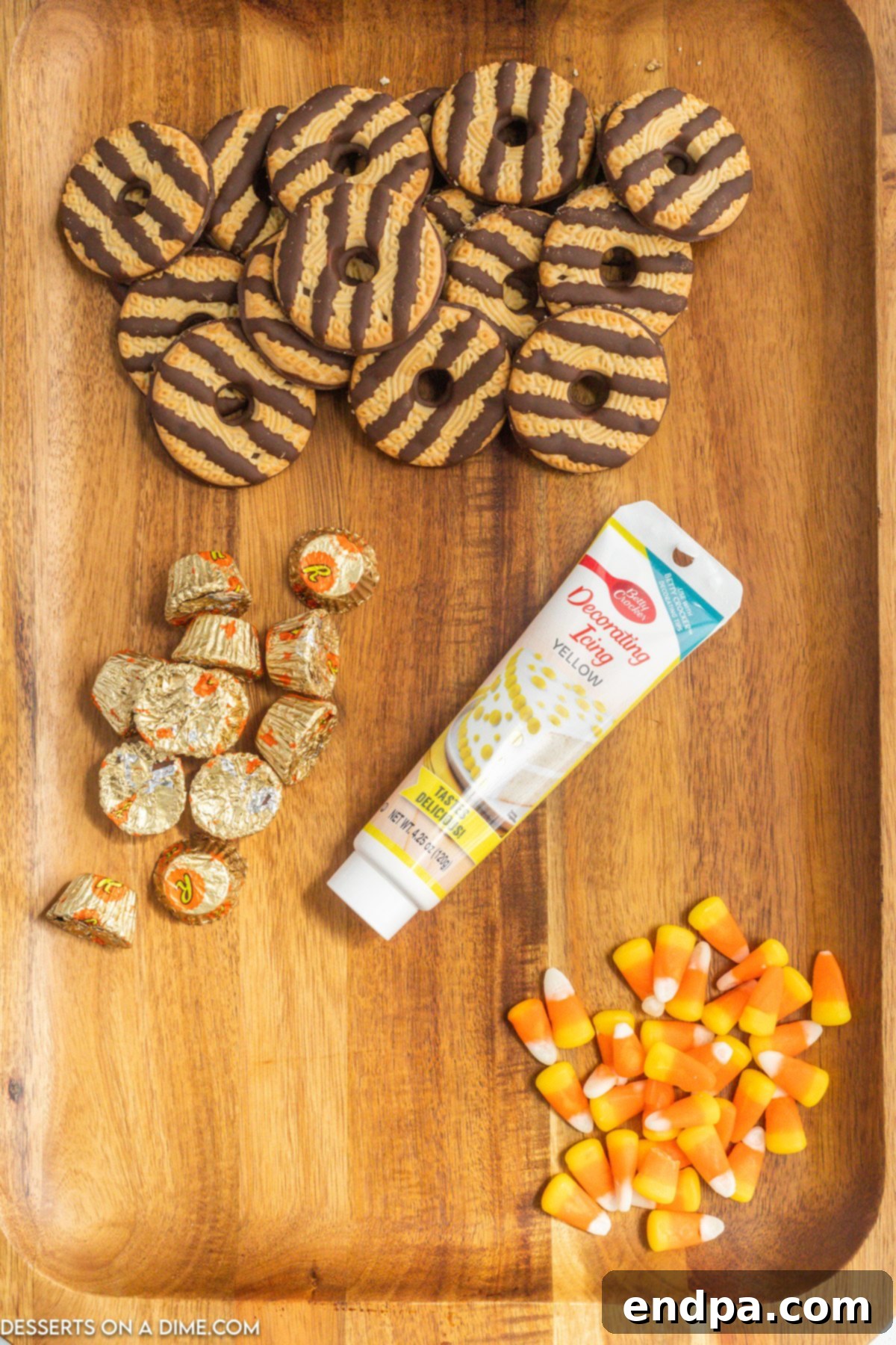 All four simple ingredients for Pilgrim Hat Cookies displayed neatly on a white surface.