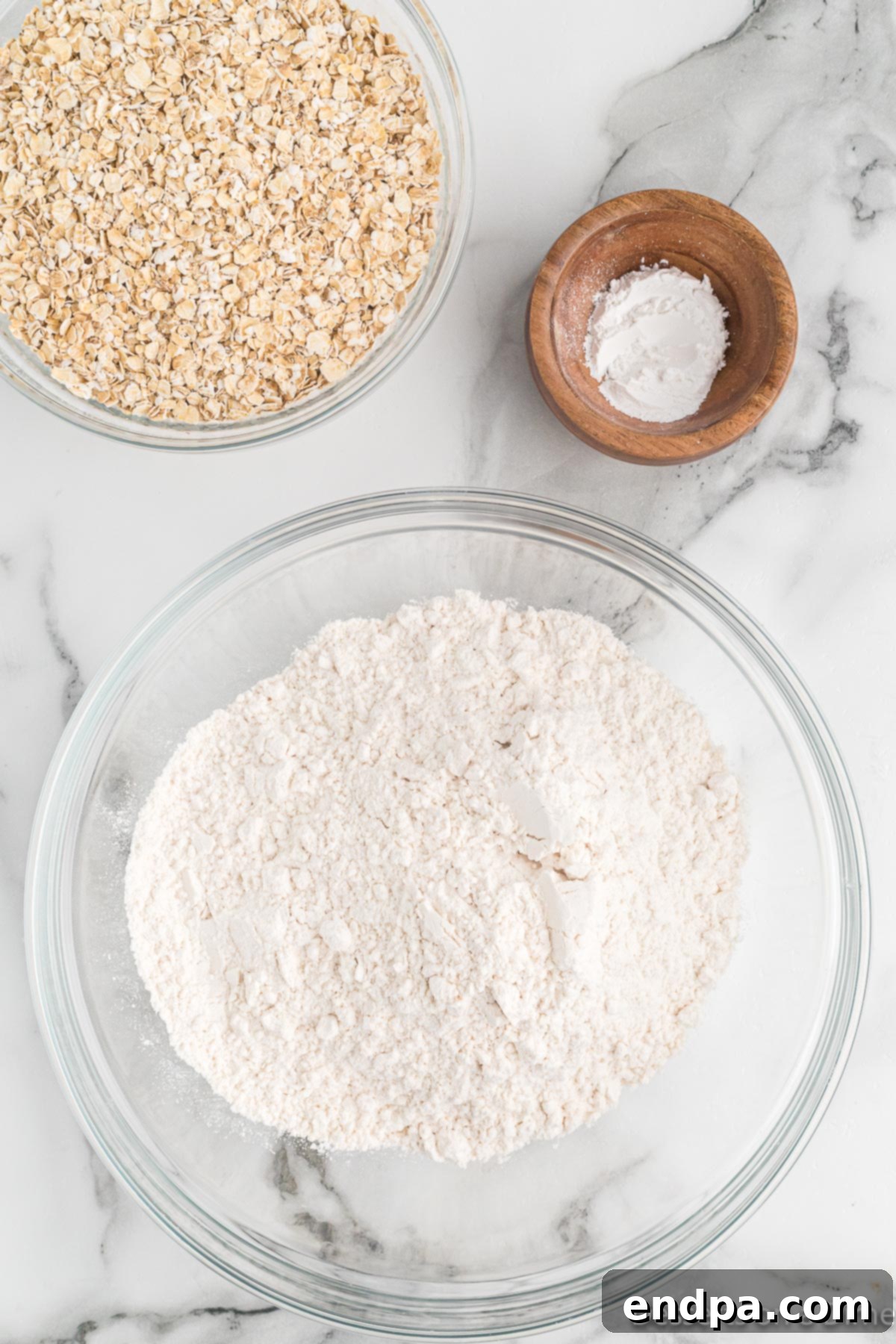 Golden Sweet Potato Cookies 4 A bowl containing flour and baking powder, ready for mixing.