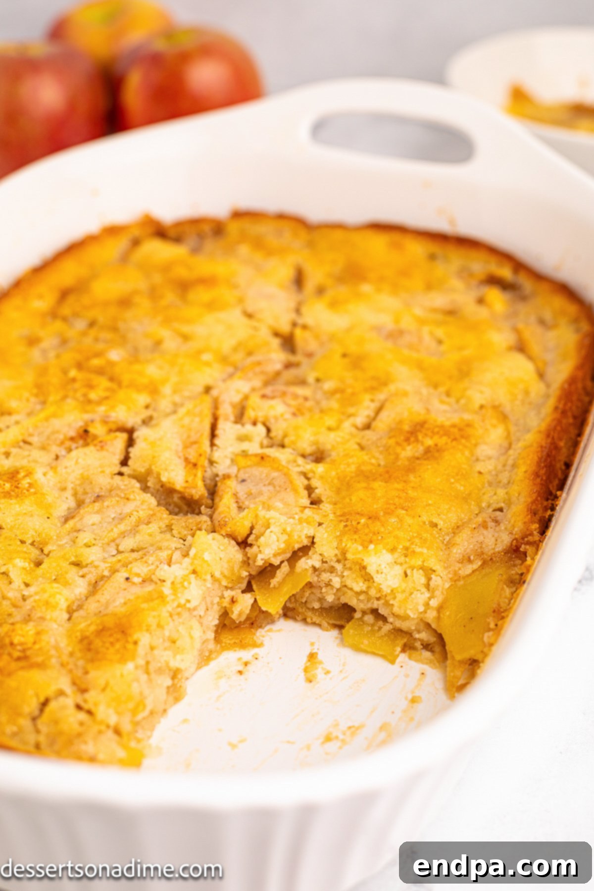 Homestyle Apple Cobbler 11 Baked apple cobbler in a rectangular baking dish, golden brown and bubbling.