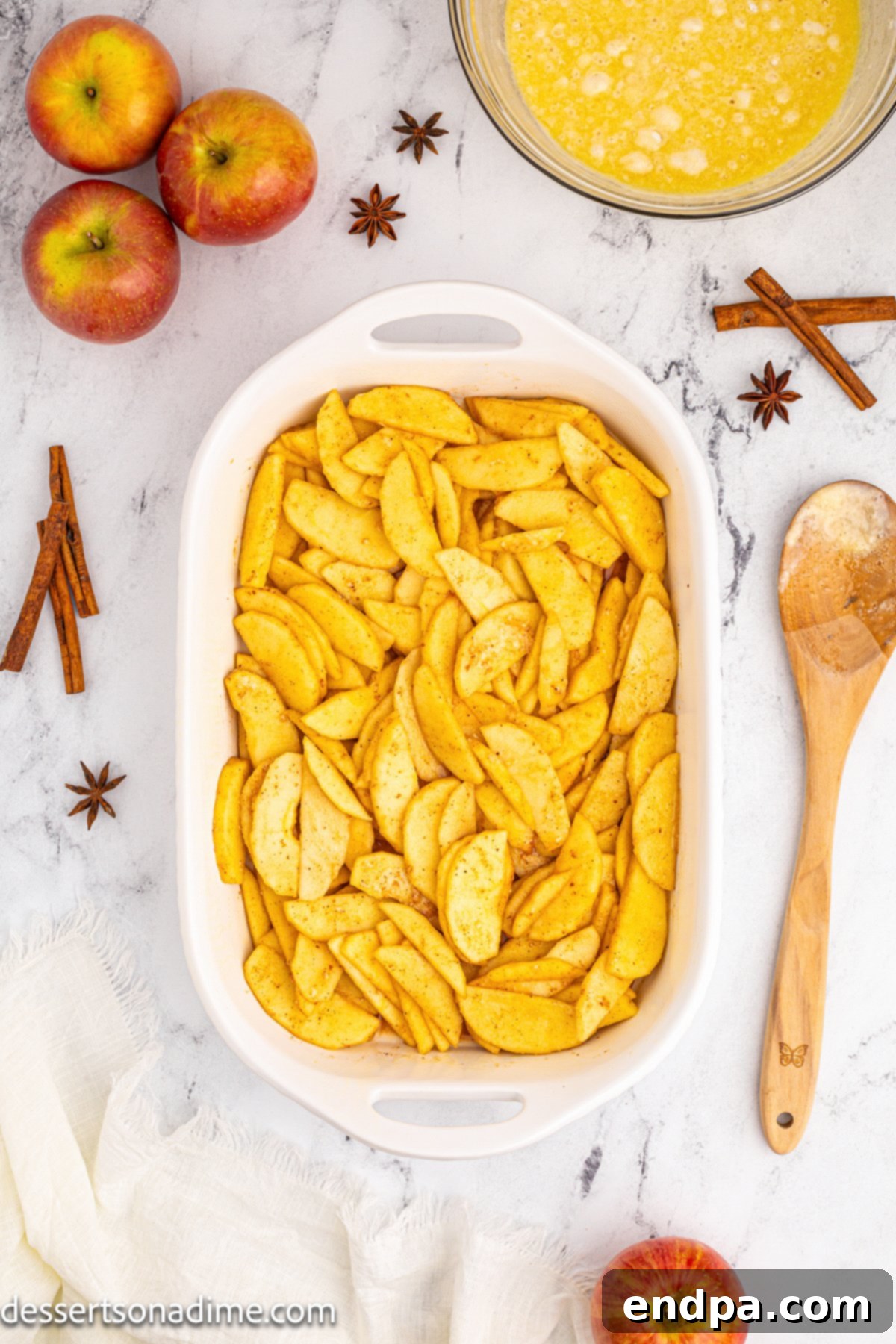 Homestyle Apple Cobbler 5 Apple mixture poured into baking dish.
