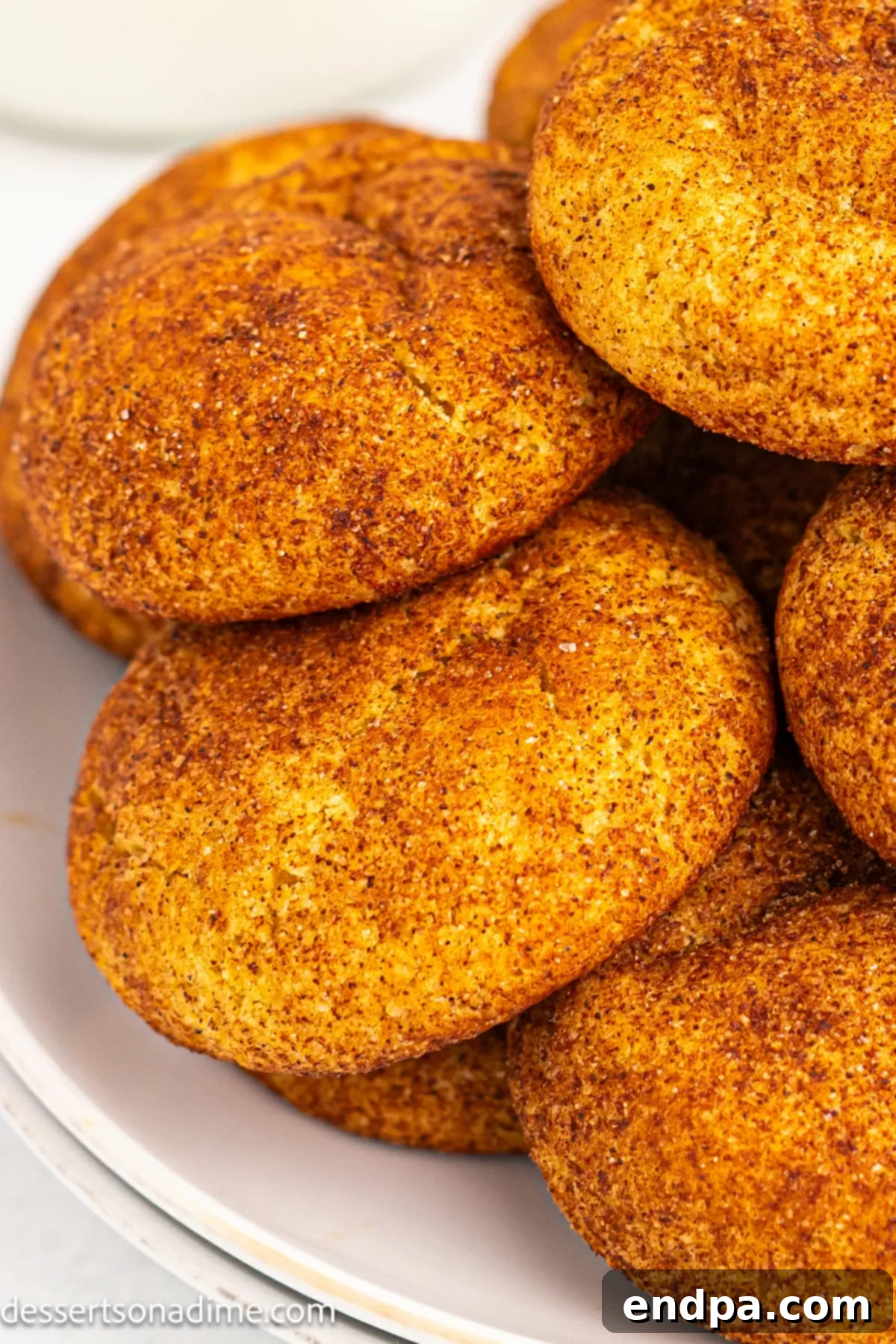 Pumpkin Snickerdoodles ready to be eaten from a platter.