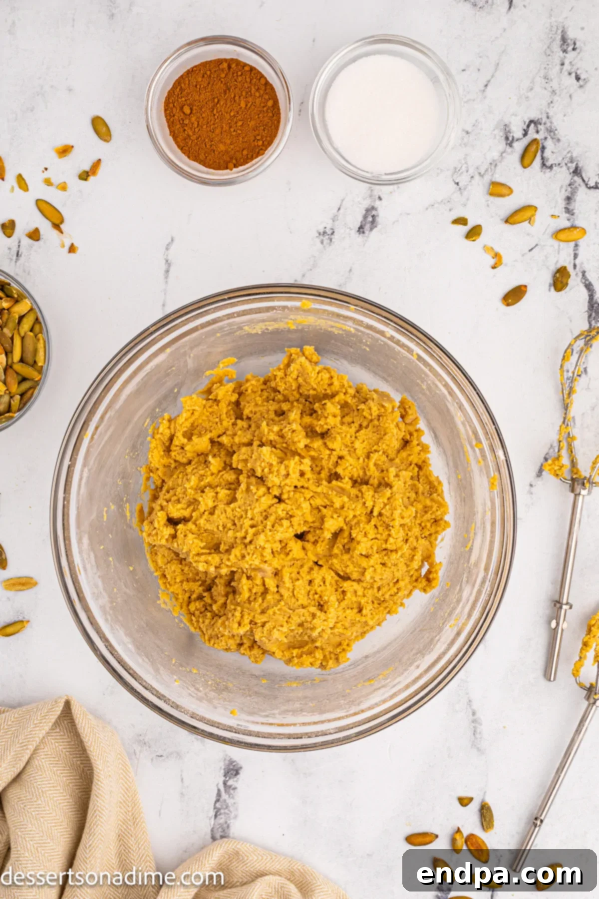 Wet and dry ingredients combined to form the pumpkin snickerdoodle dough.