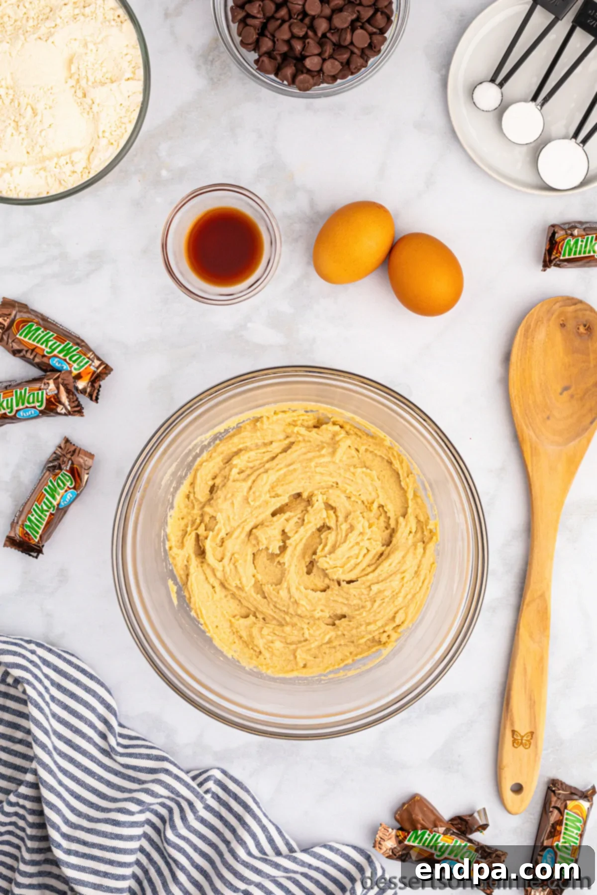 Nougat Caramel Dream Cookies 4 A mixing bowl containing softened butter, granulated sugar, and brown sugar, ready to be creamed together.
