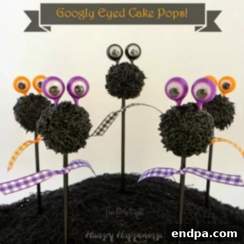 Spooktacular Cake Pops 7 Brightly colored googly-eyed cake pops with textured frosting, looking whimsical and fun.