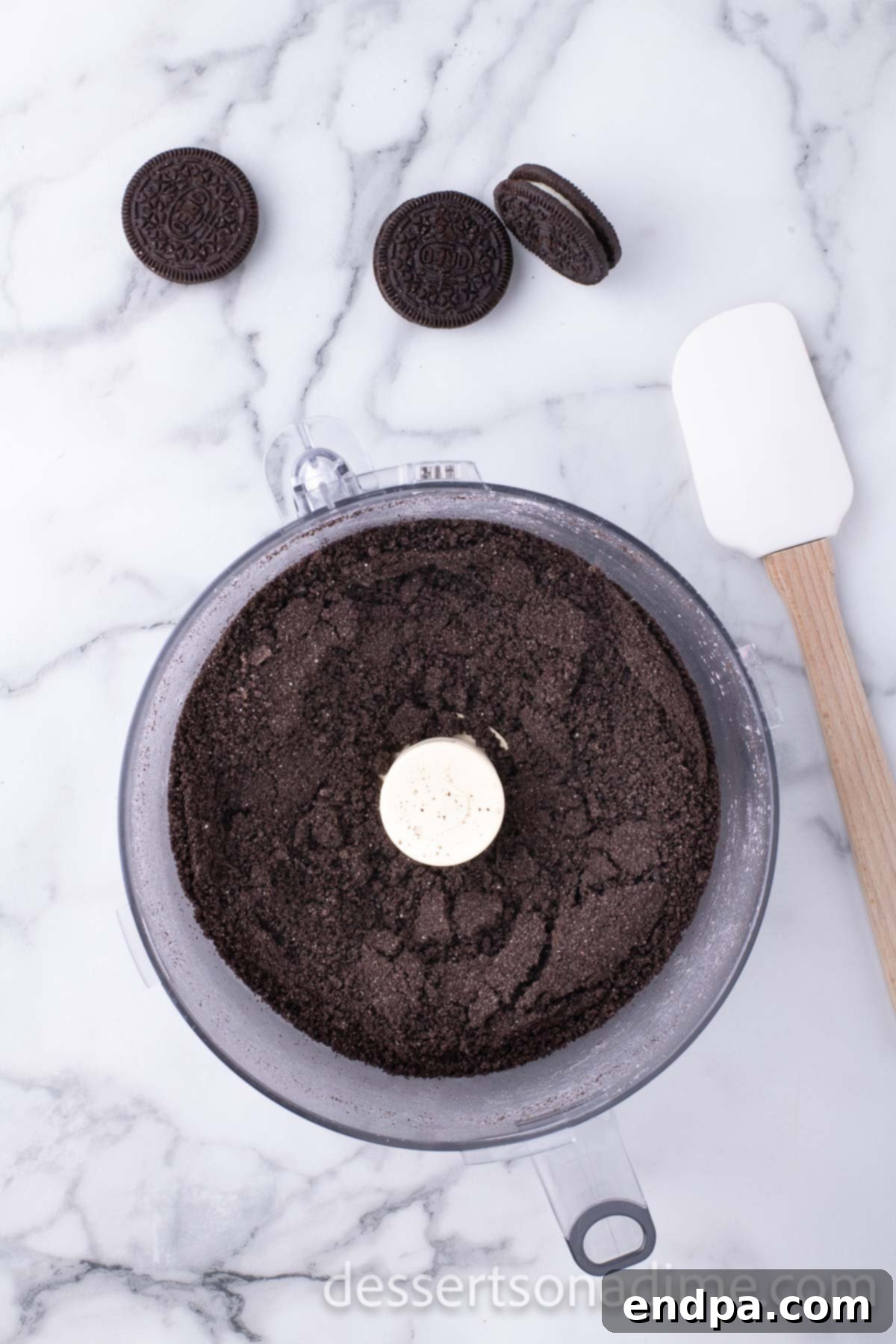 Cool Mint Oreo Truffles 5 Oreo cookies crushed into fine crumbs in a food processor.