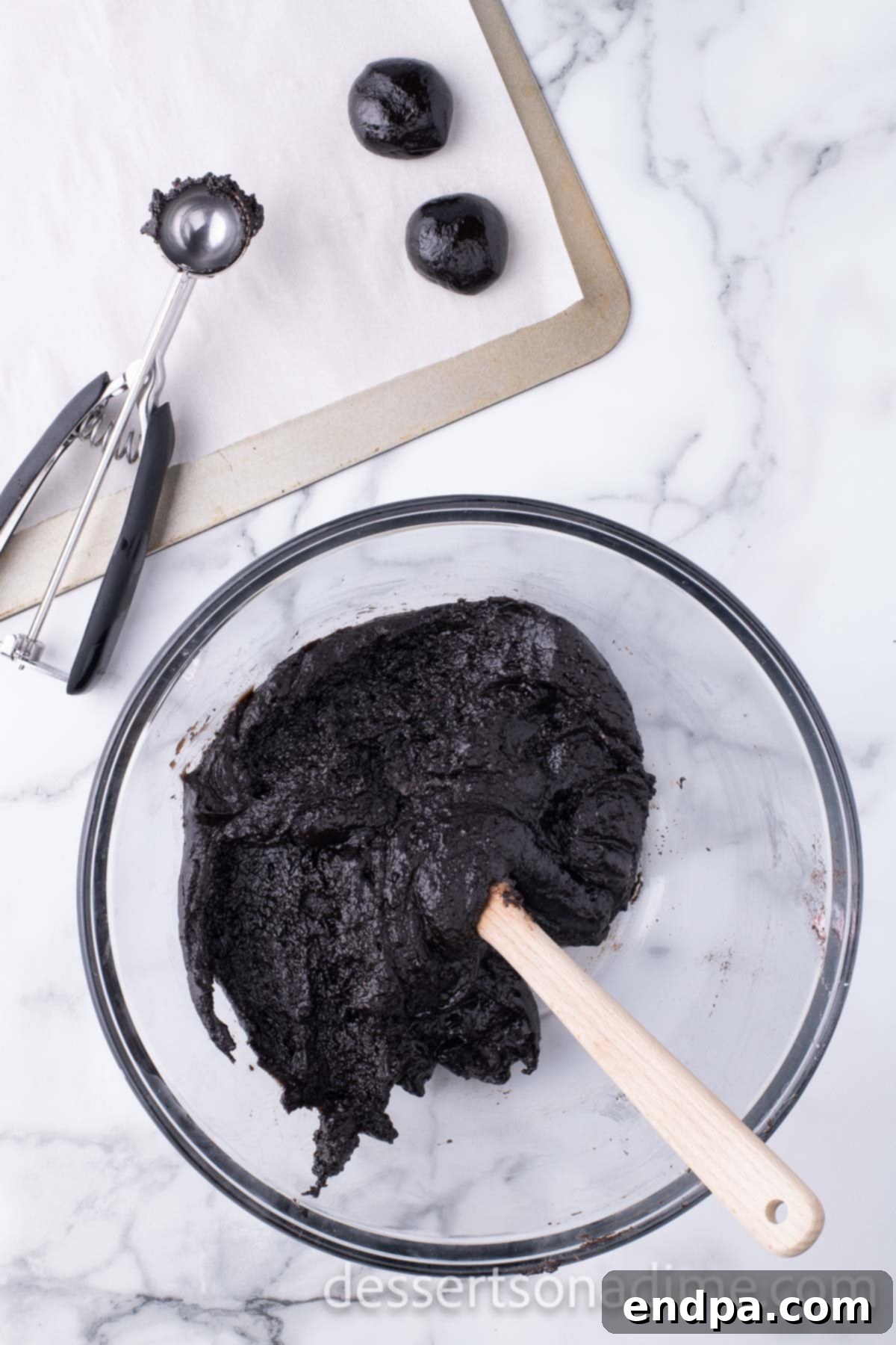 Cool Mint Oreo Truffles 7 The blended cream cheese, Oreo, and peppermint mixture in a bowl.