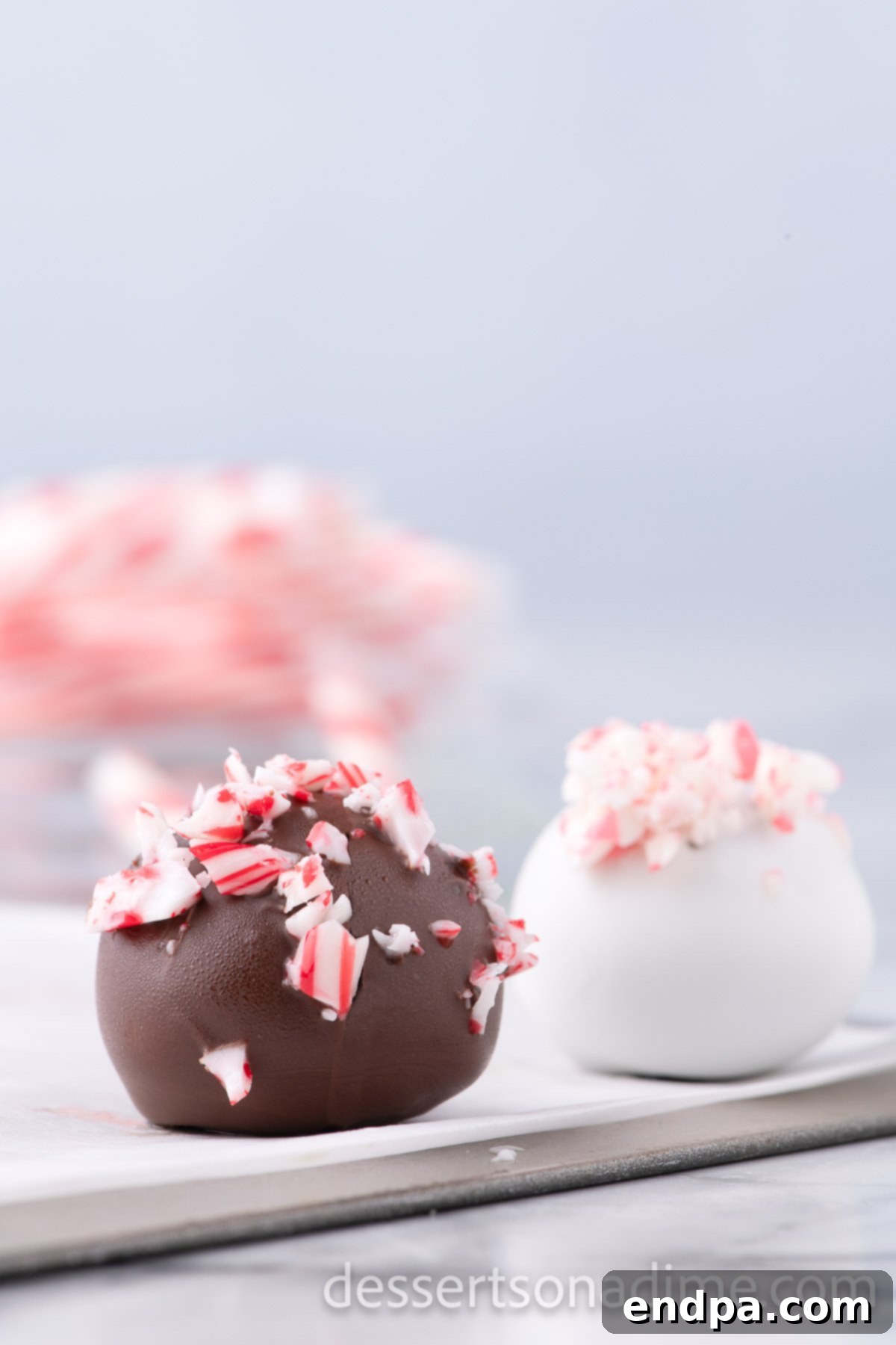 Cool Mint Oreo Truffles 10 A platter of beautifully decorated Peppermint Oreo Balls, ready for a holiday party.