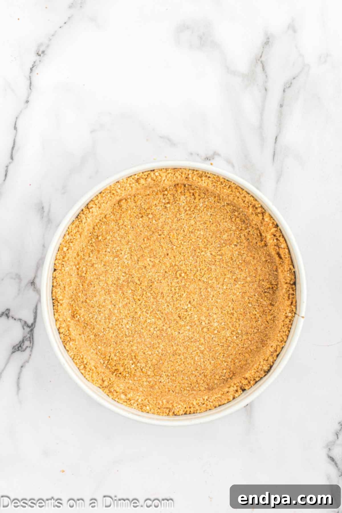 Simple No-Bake Cheesecake Dream 6 Graham cracker mixture pressed into pan.