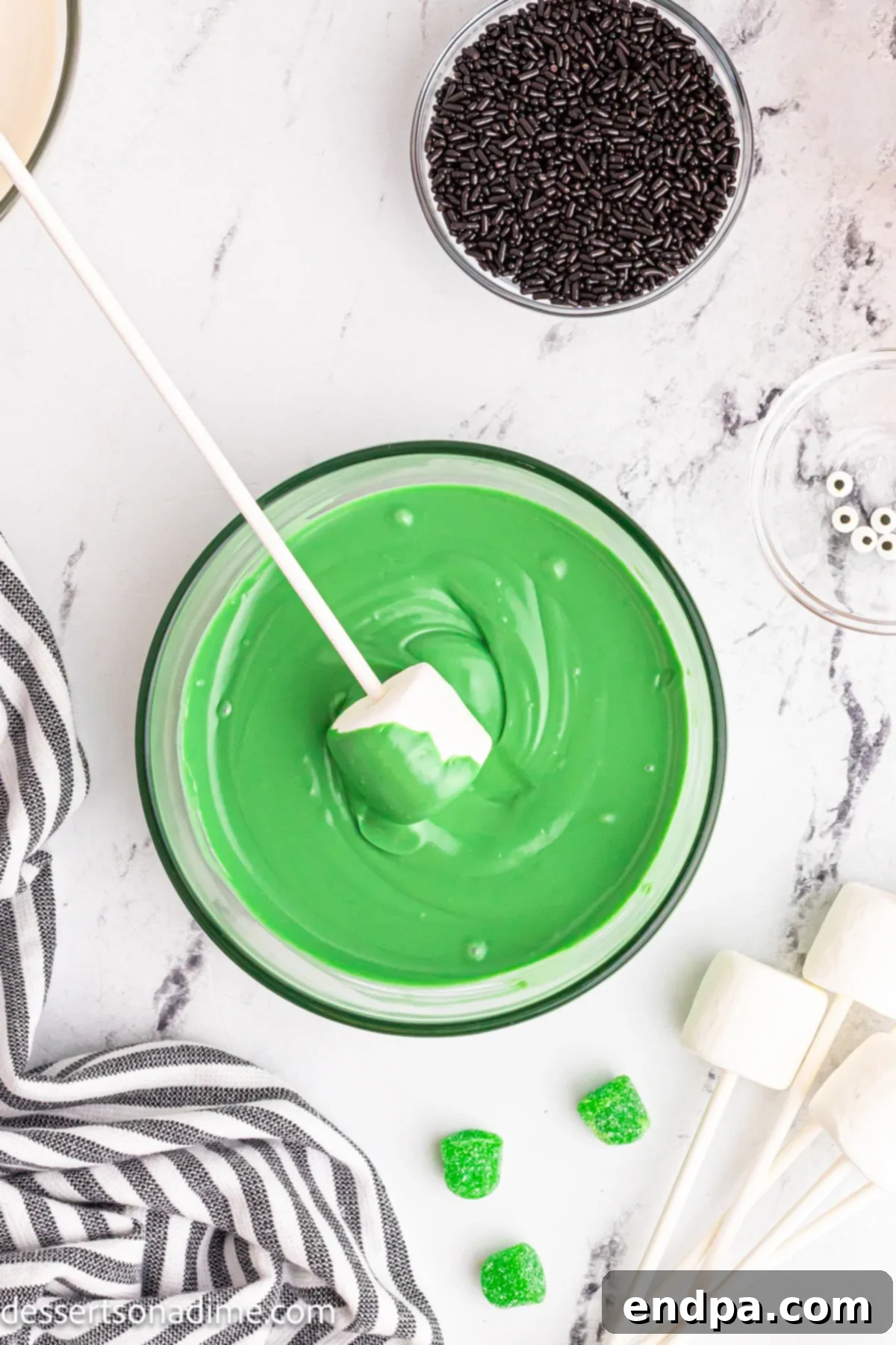 Marshmallow dipped in green candy melts. 
