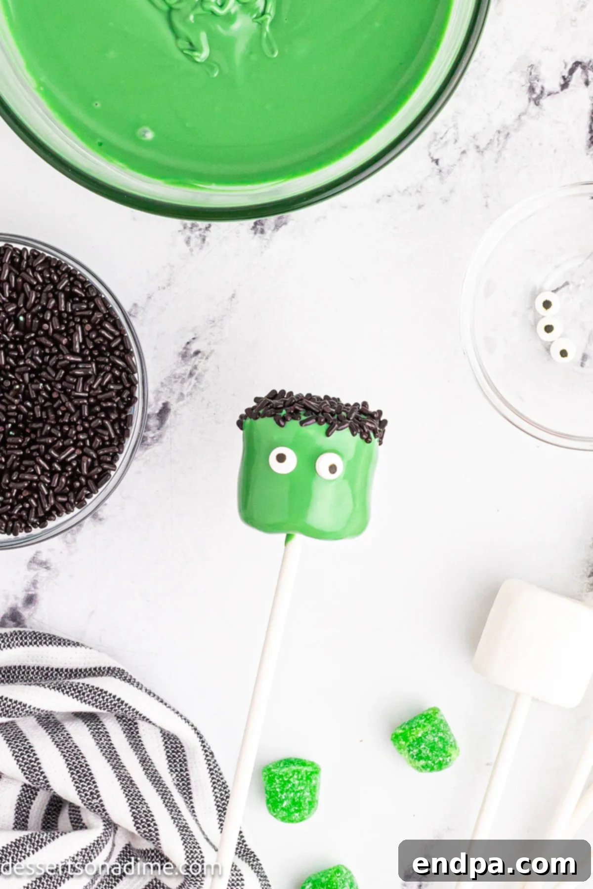 Black sprinkles on top of the marshmallow. 