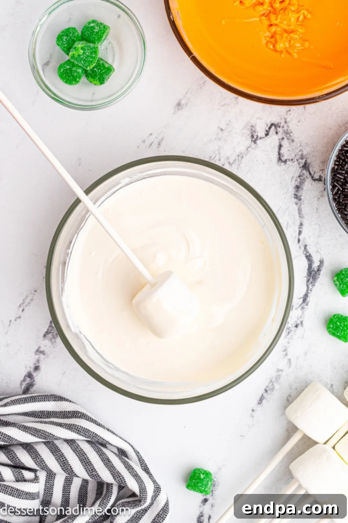 Marshmallow dipped in white candy melts. 