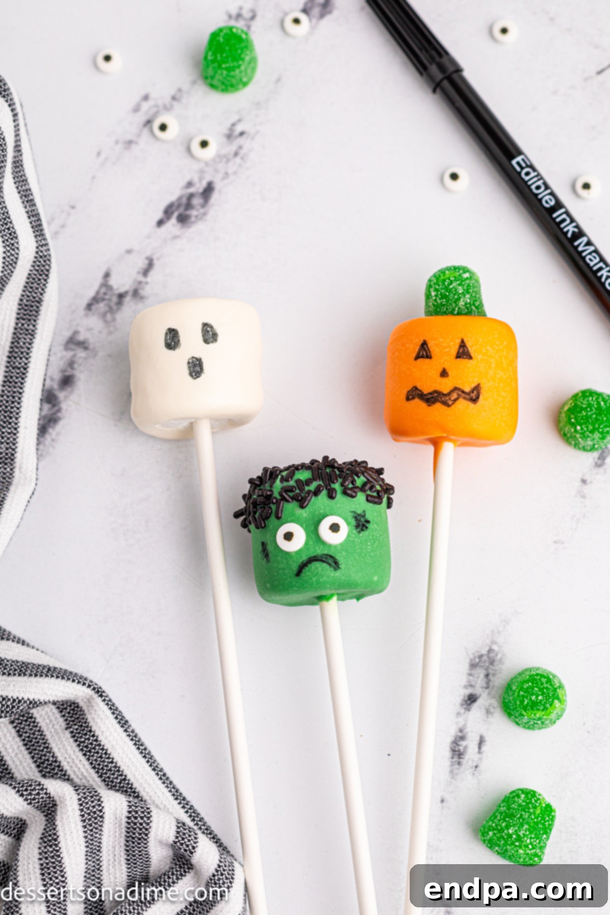 Cake pops decorated with faces.