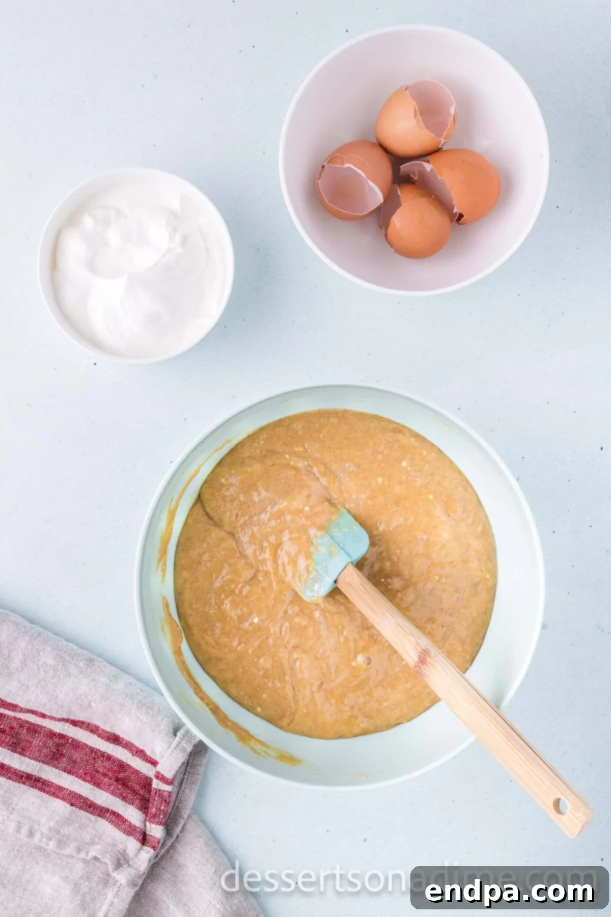 Cinnamon Sugar Swirl Cupcakes 6 Stir in sour cream to the cake mix mixture