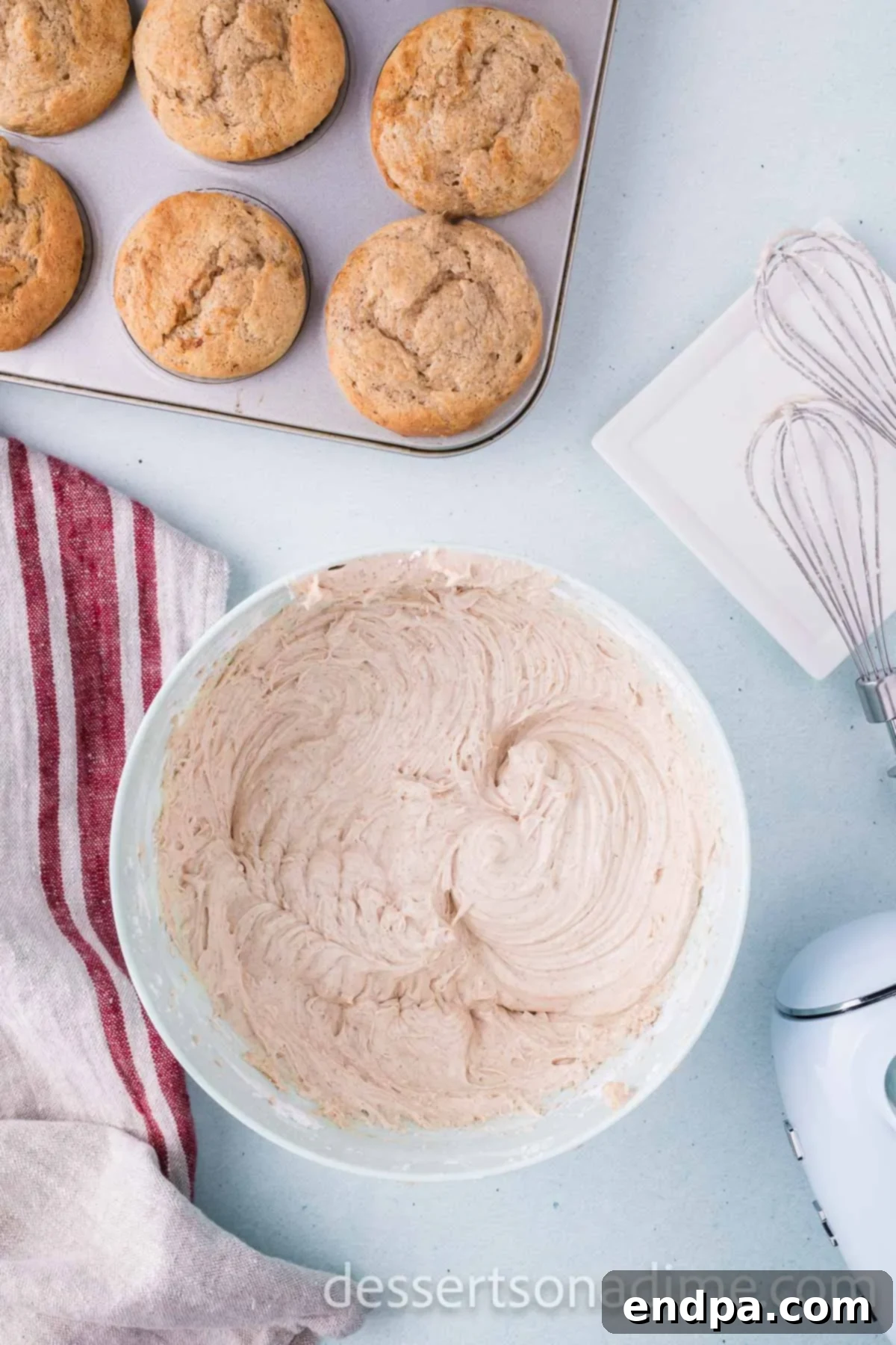 Cinnamon Sugar Swirl Cupcakes 10 Stirring in vanilla extract and cinnamon in a bowl