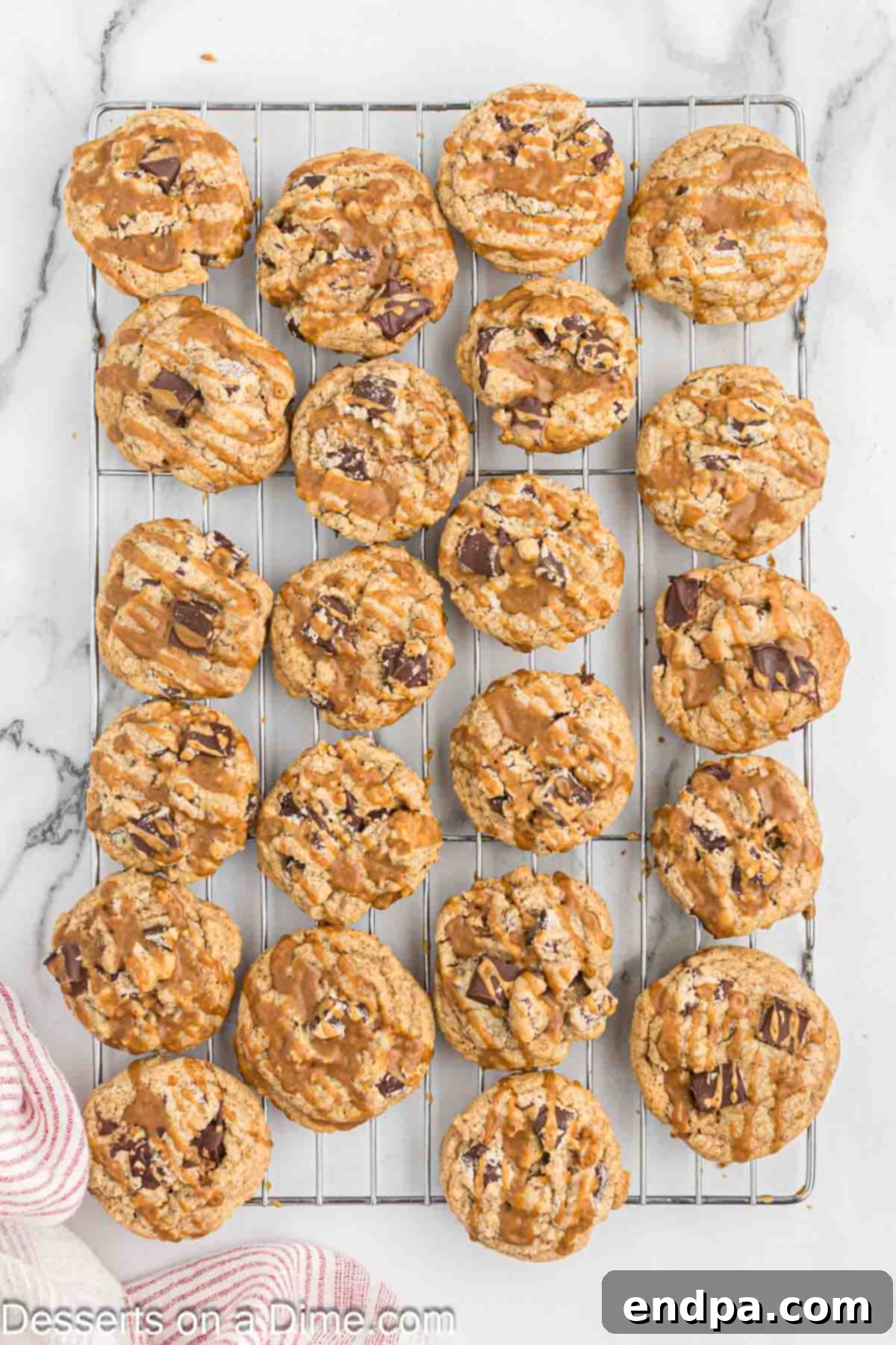 Espresso Delights 9 Baked coffee cookies cooling on a wire rack, freshly drizzled with coffee glaze.