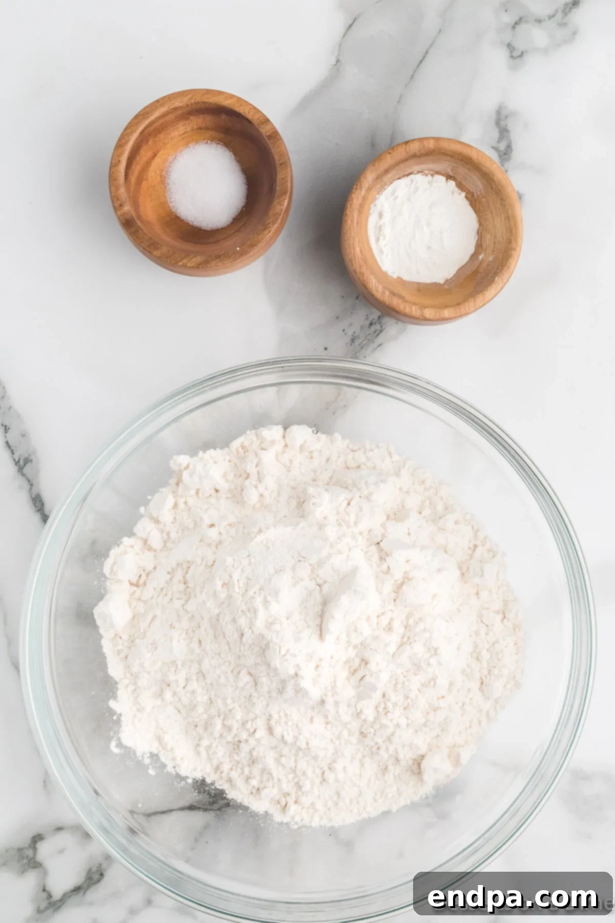 Dry ingredients including flour, baking soda, cornstarch, and salt mixed in a separate bowl.