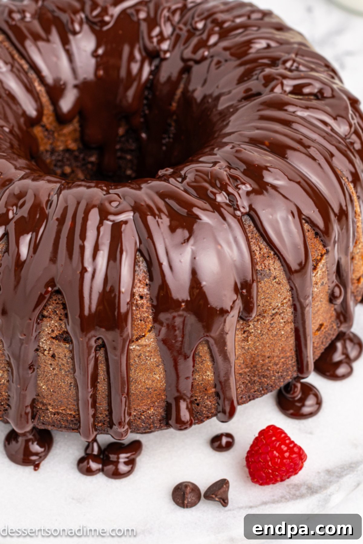 Decadent Chocolate Brownie Cake topped with a glossy chocolate ganache, ready to be served.