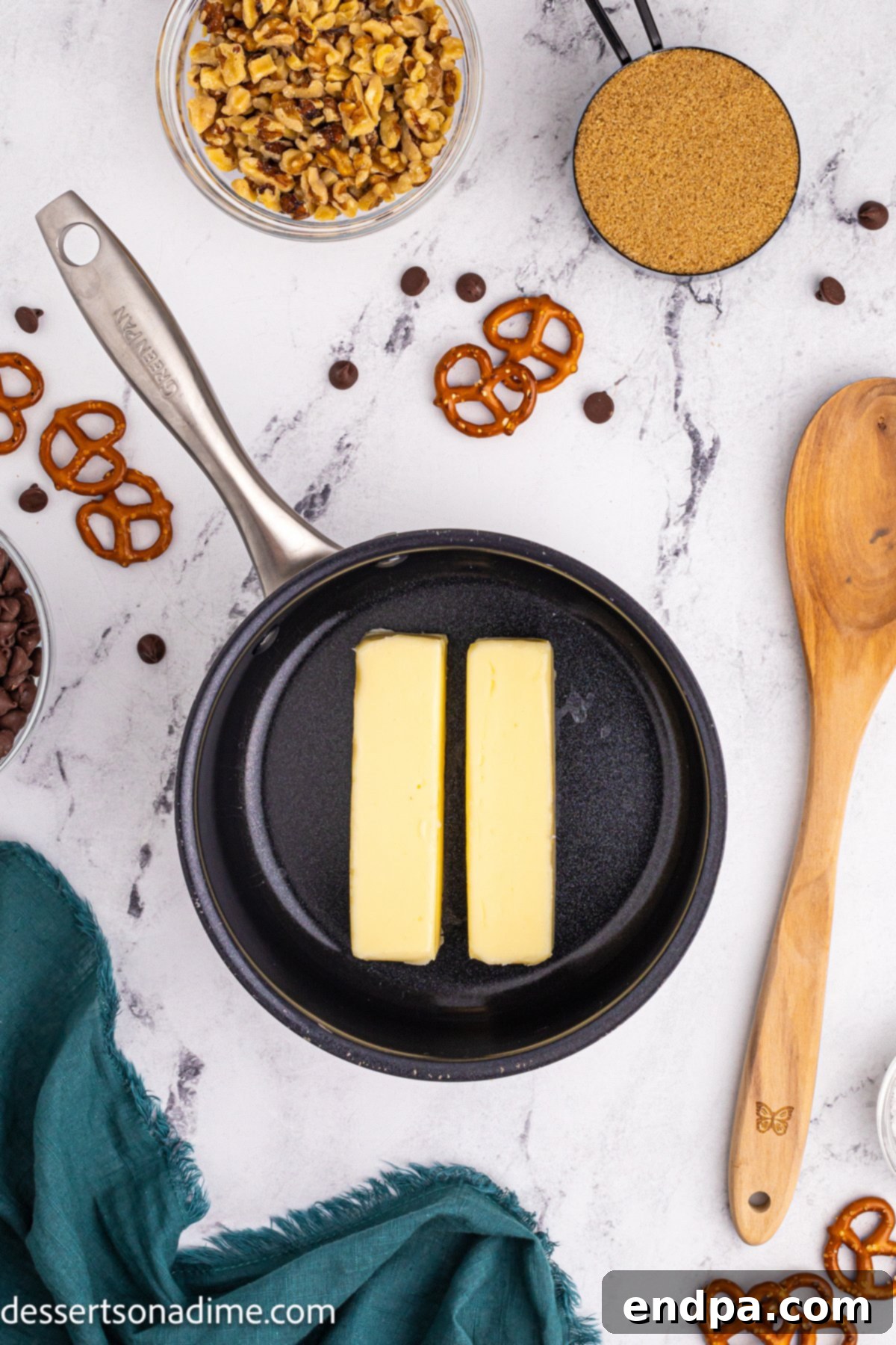 Twisted Toffee Treat 6 Two sticks of butter melting in a saucepan over low-medium heat.