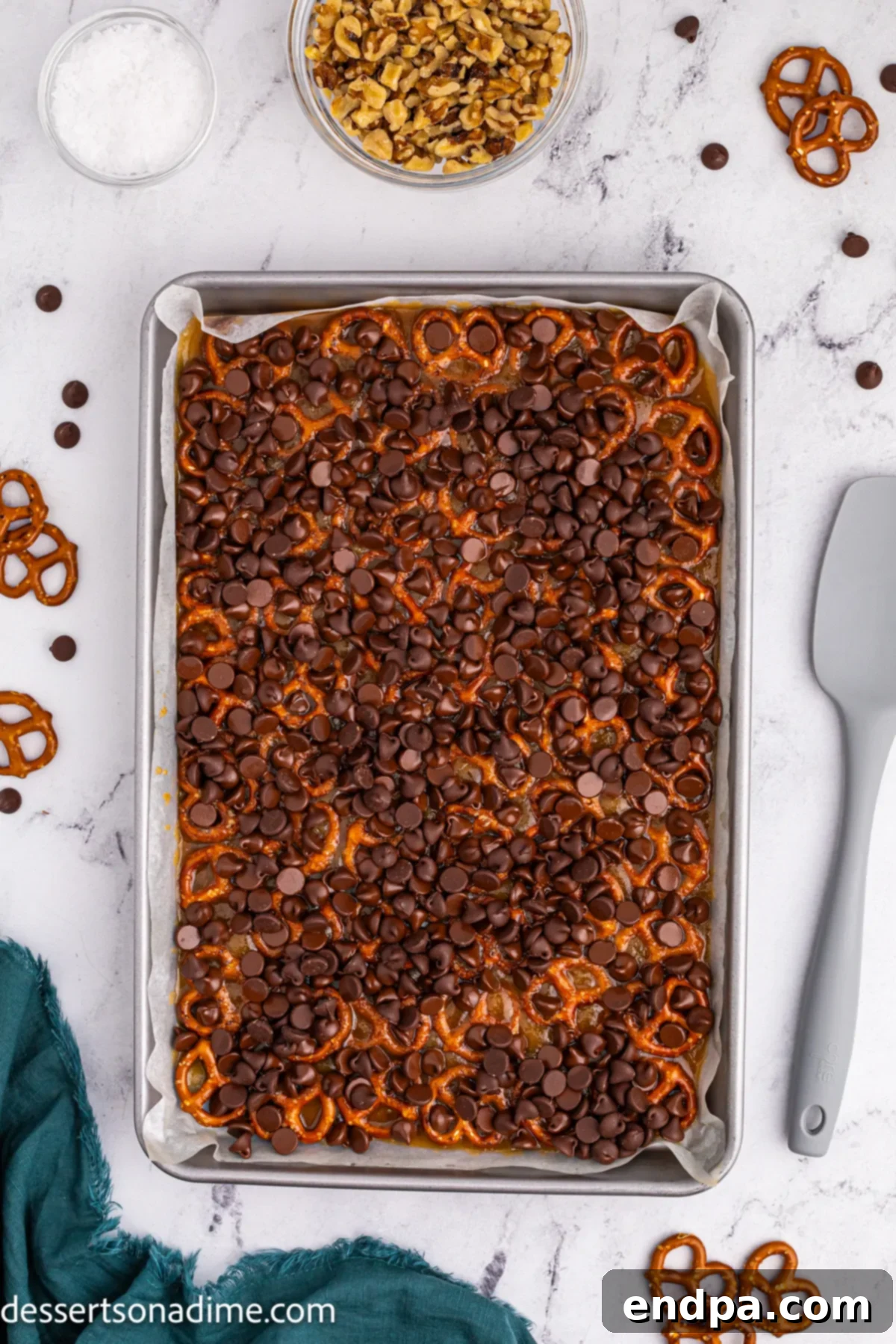 Twisted Toffee Treat 9 Chocolate chips generously sprinkled over the hot, baked pretzel and toffee mixture.