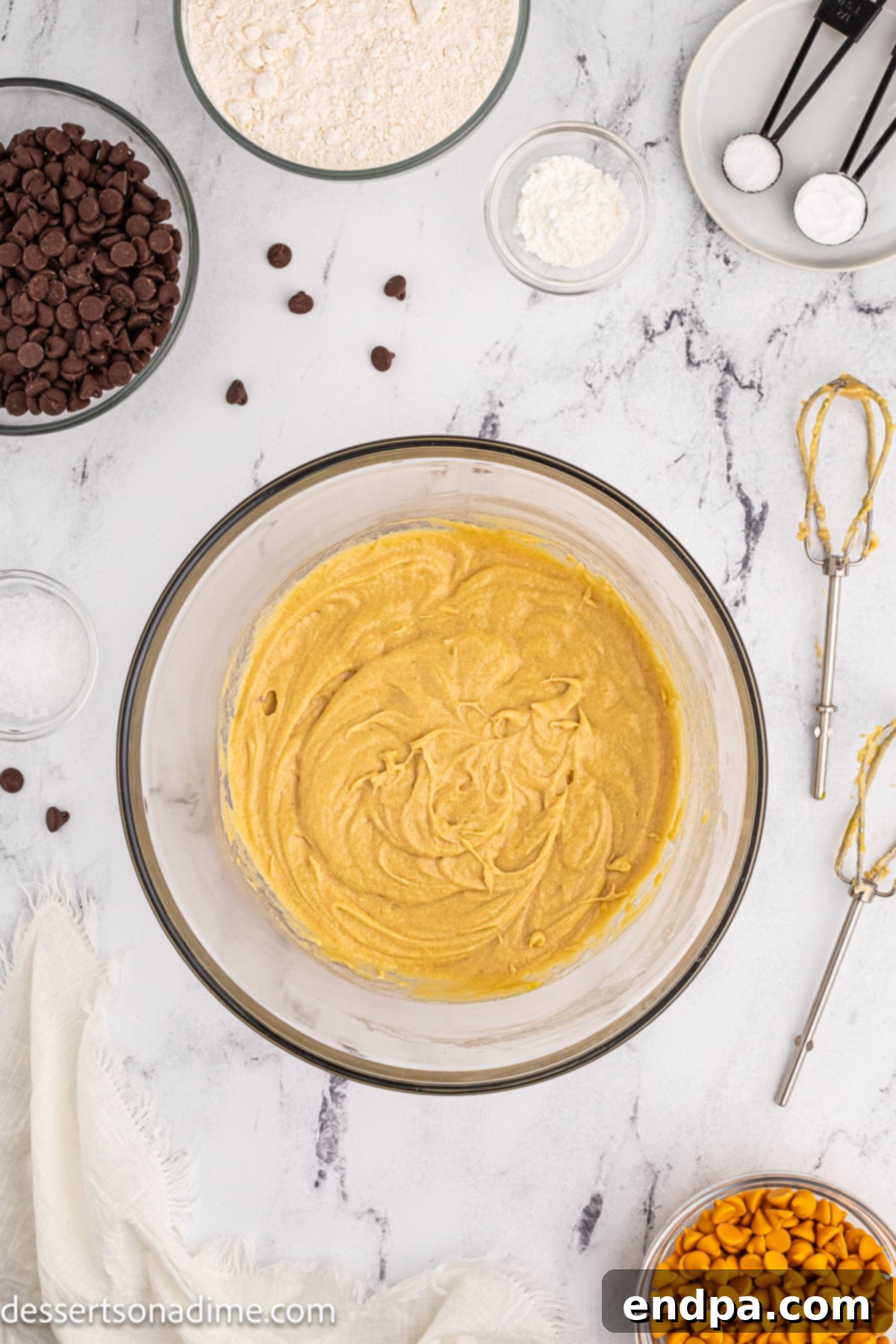 The butter, sugar, egg, and vanilla mixture fully combined into a smooth batter.