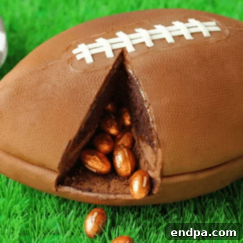 Game Day Football Cake with a candy surprise inside.