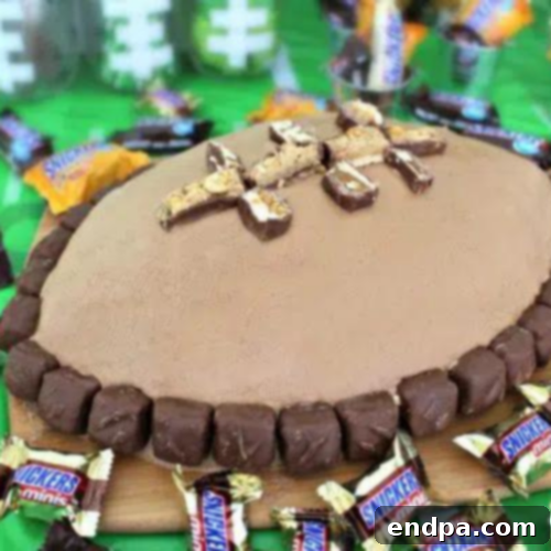 Football Shaped Cake with Snickers candy.