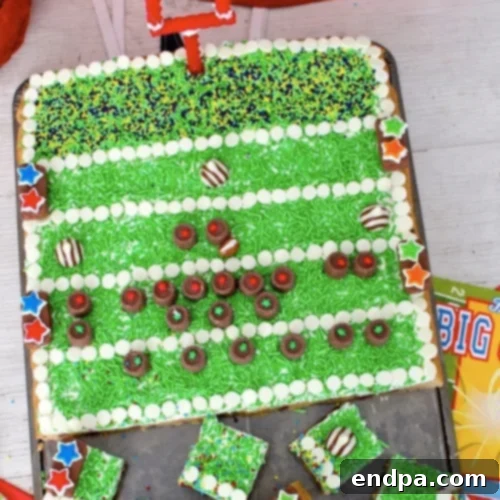 Football Field Cookie Cake with green frosting and chocolate chips.