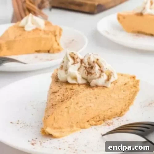 32 Christmas Pie Delights 6 A delightful no-bake pumpkin pie, perfect for quick holiday desserts.