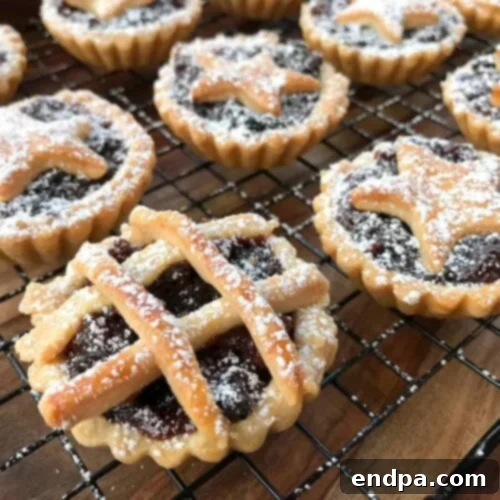 32 Christmas Pie Delights 9 Traditional Mince Pies, golden and festive, perfect for holiday indulgence.