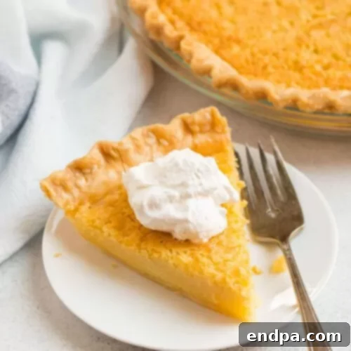 32 Christmas Pie Delights 12 A slice of classic Buttermilk Pie, with its signature lightly crackled top.