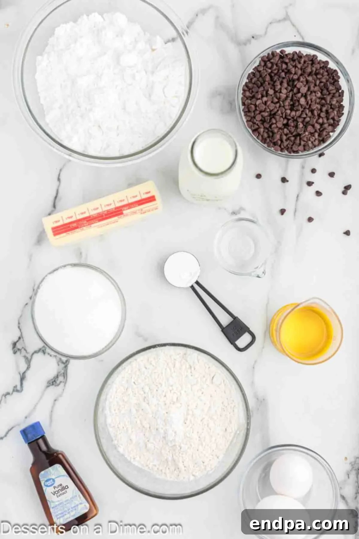 Decadent Chocolate Chip Cupcakes 3 Ingredients for Chocolate Chip Cupcakes - flour, sugar, oil, chocolate chips, butter, powdered sugar, vanilla.