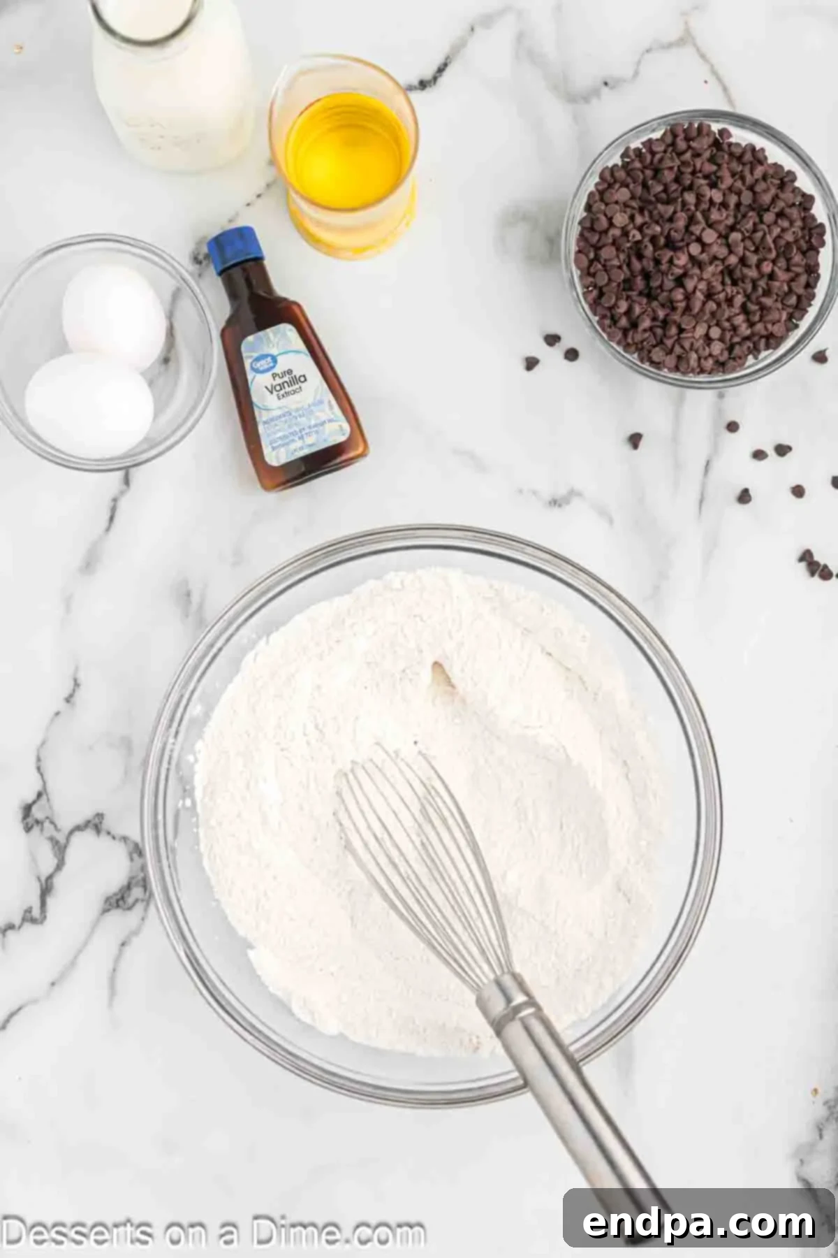 Decadent Chocolate Chip Cupcakes 4 Mixing bowl with dry ingredients.