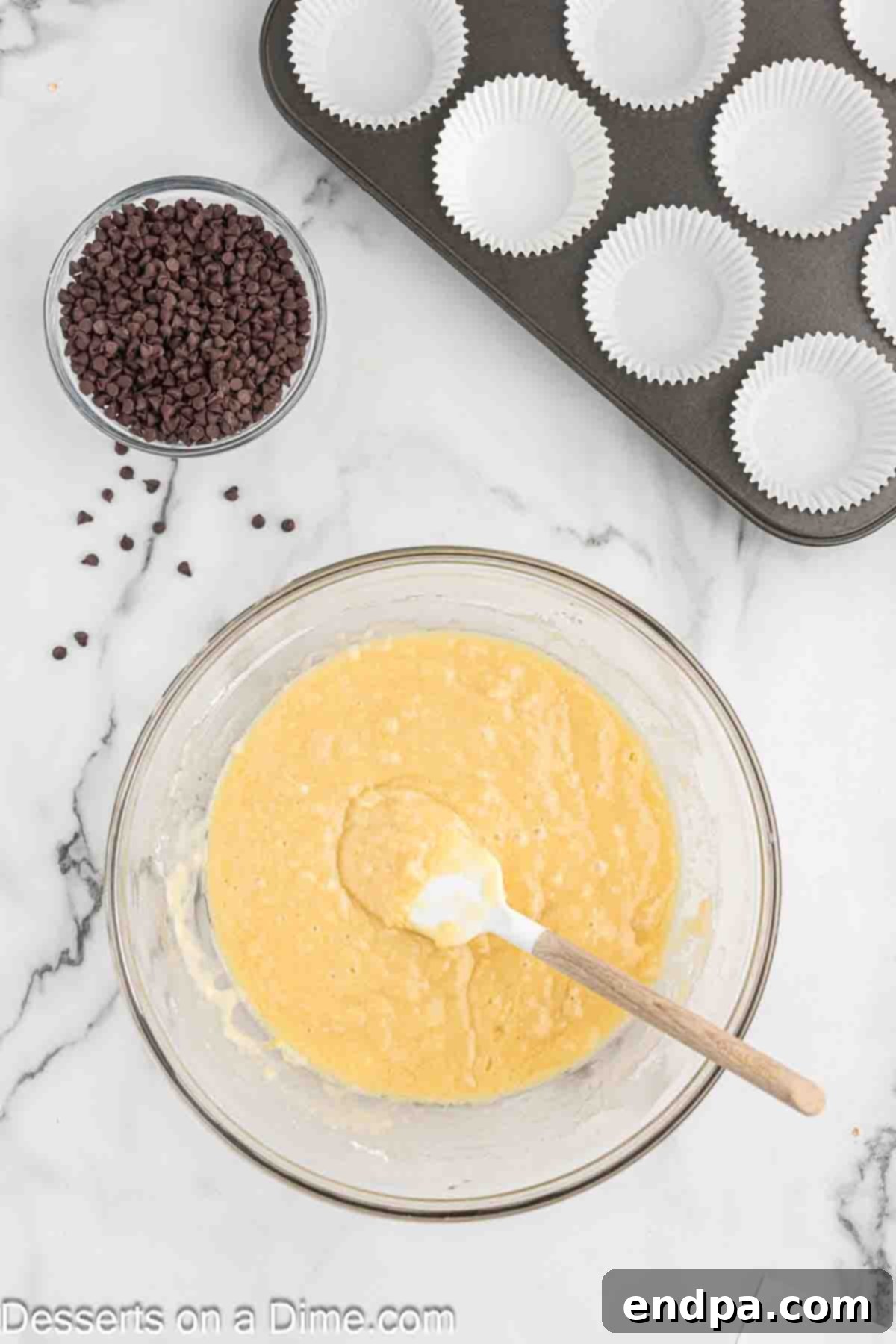 Decadent Chocolate Chip Cupcakes 6 Mixing bowl with wet and dry ingredients combined.