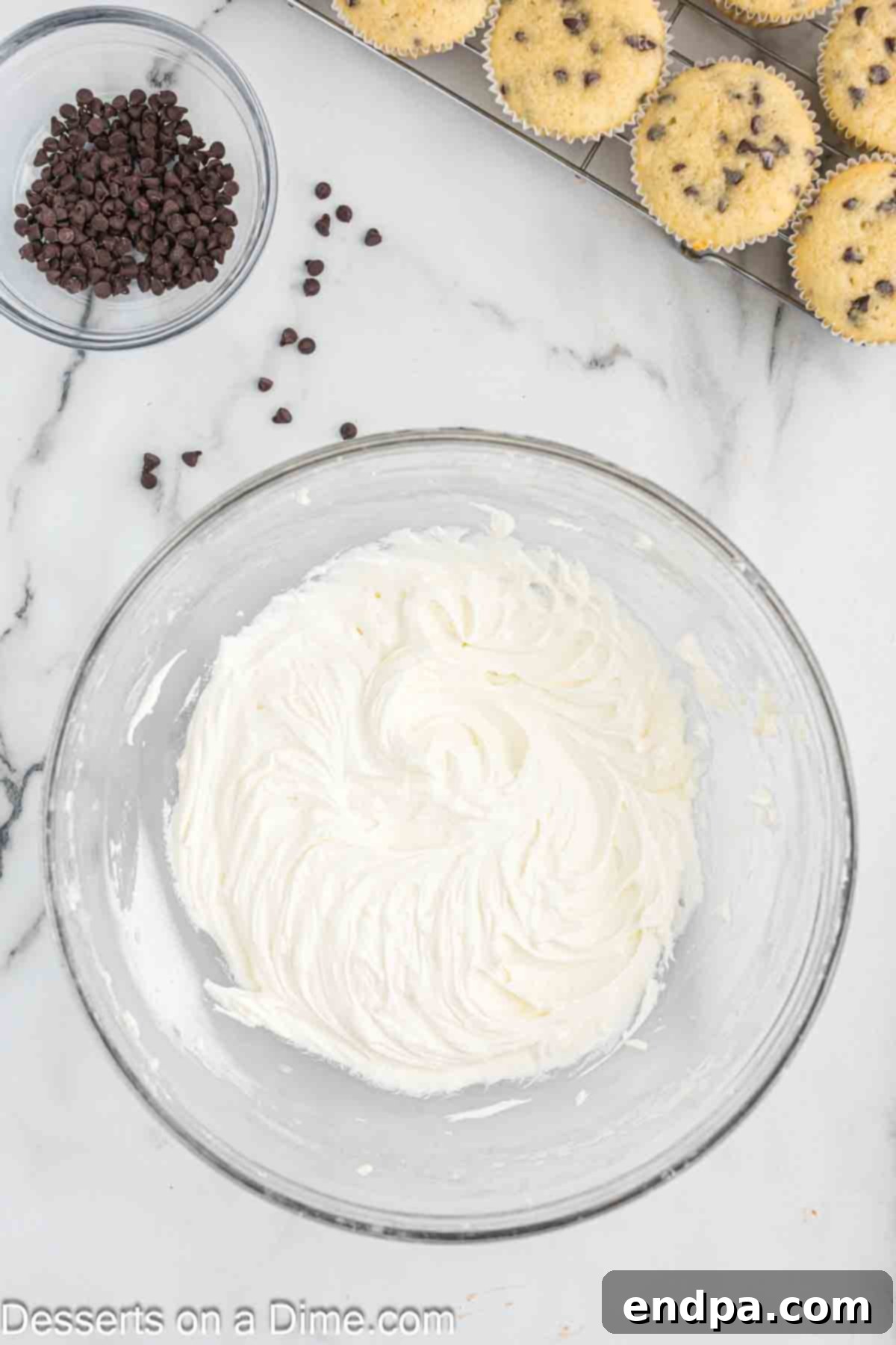 Decadent Chocolate Chip Cupcakes 9 Mixing bowl with frosting ingredients.