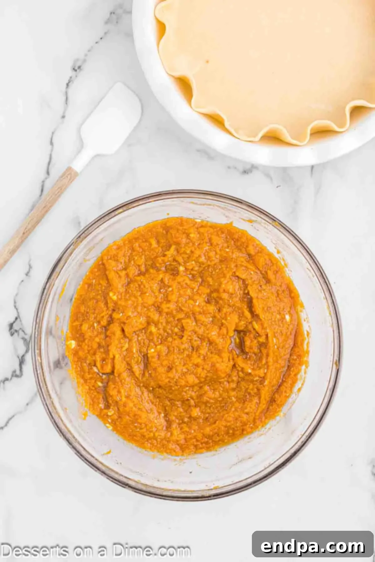 Velvety Sweet Potato Pecan Delight 5 Sweet potato mixture in a bowl, thoroughly combined and smooth.