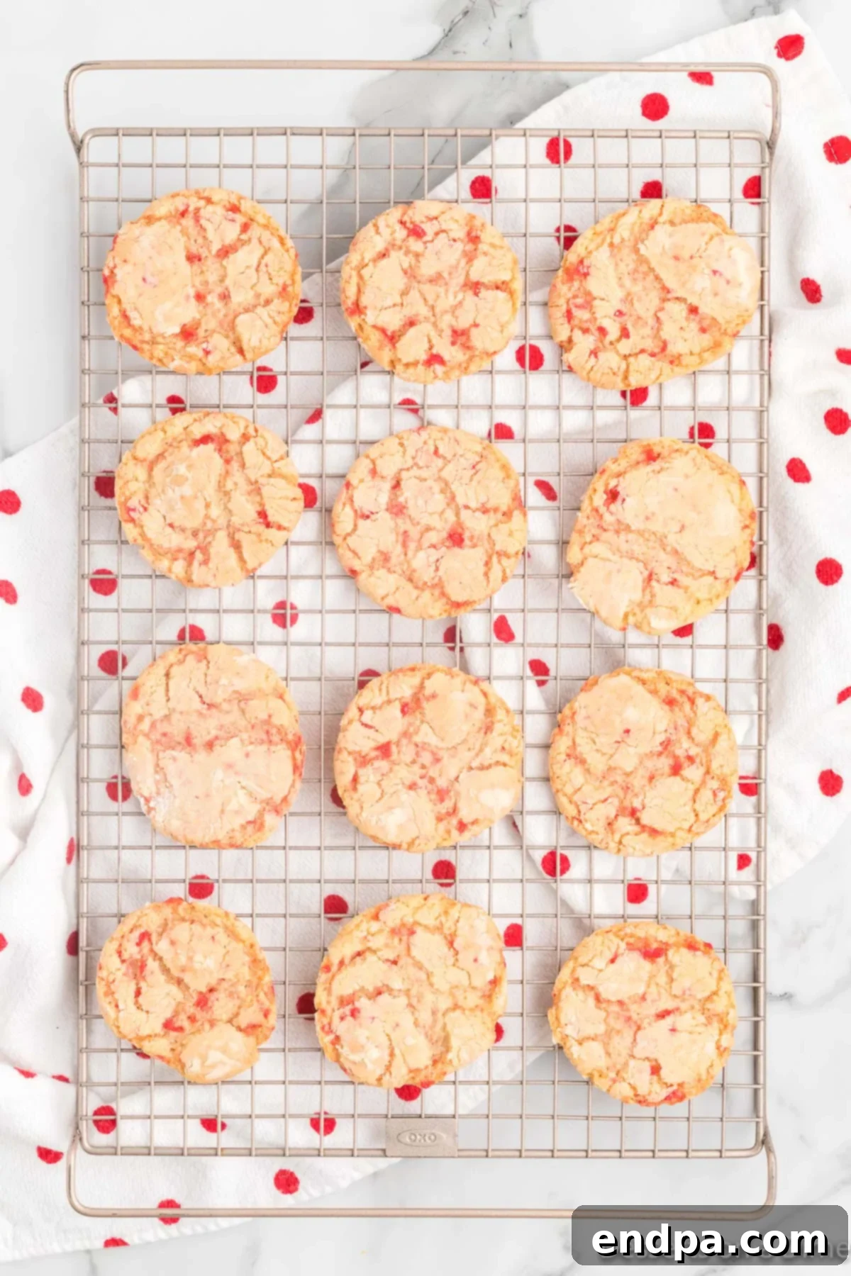 Sizzling Indulgences 9 Freshly baked Red Hot Cookies cooling on a wire rack.